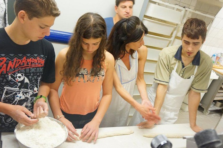 Guests enjoying the behind the scenes access of a "Boulangerie" (Bakery) with A Taste of Paris 3