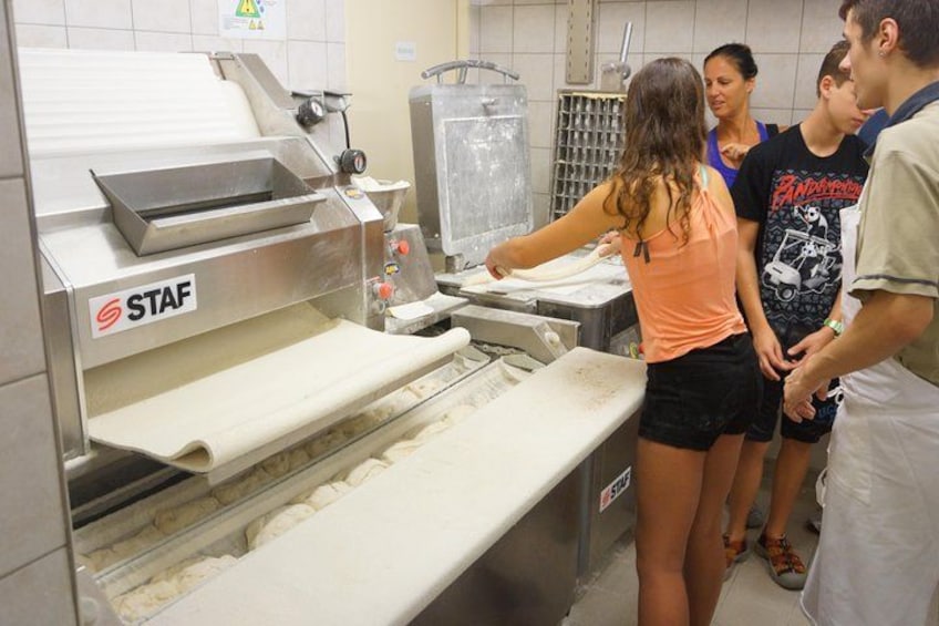 Guests enjoying the behind the scenes access of a "Boulangerie" (Bakery) with A Taste of Paris 5