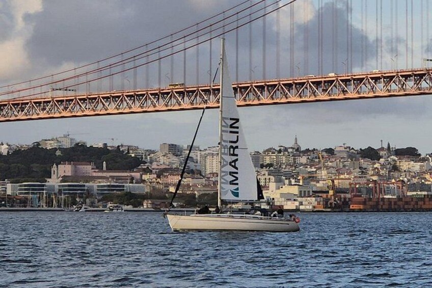 sailing boat under 25 april bridge 2