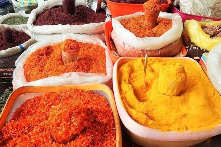 Various spices in sacks and containers. 1