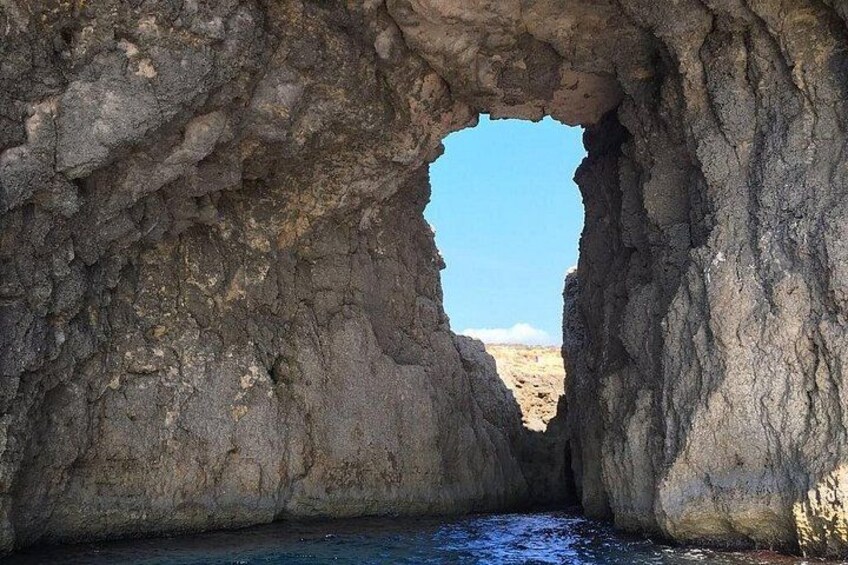 A natural rock formation with a water channel. 4