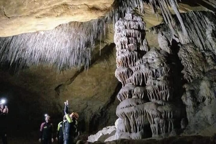 A cave with stalactites and stalagmites. 5