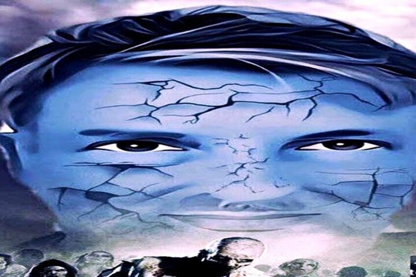 Une personne au visage bleu et à la peau craquelée. 2