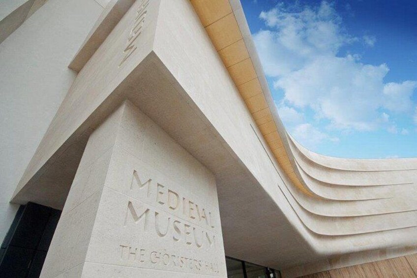 A building with the inscription 'MEDIEVAL MUSEUM THE GHOSTS OF.' 2