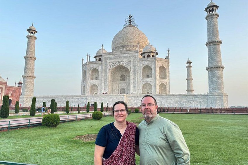 The Taj Mahal with two people standing in front. 1