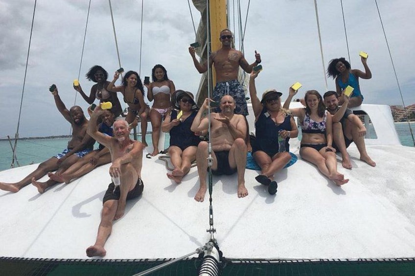 A group of people on a sailboat. 4