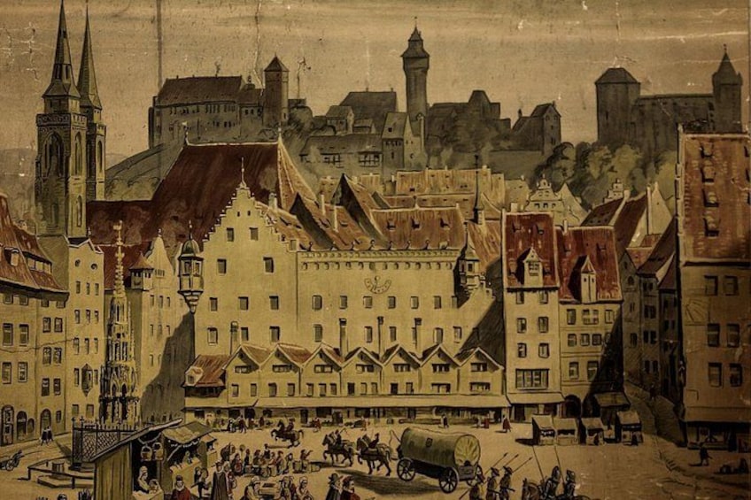 Une place historique, bordée de bâtiments, avec une église et un château en arrière-plan. 5