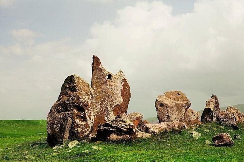 A landscape with large rock formations. 3