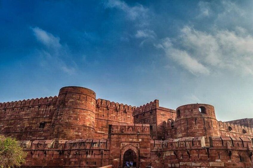 A large brick fort with multiple towers and a central gate. 2