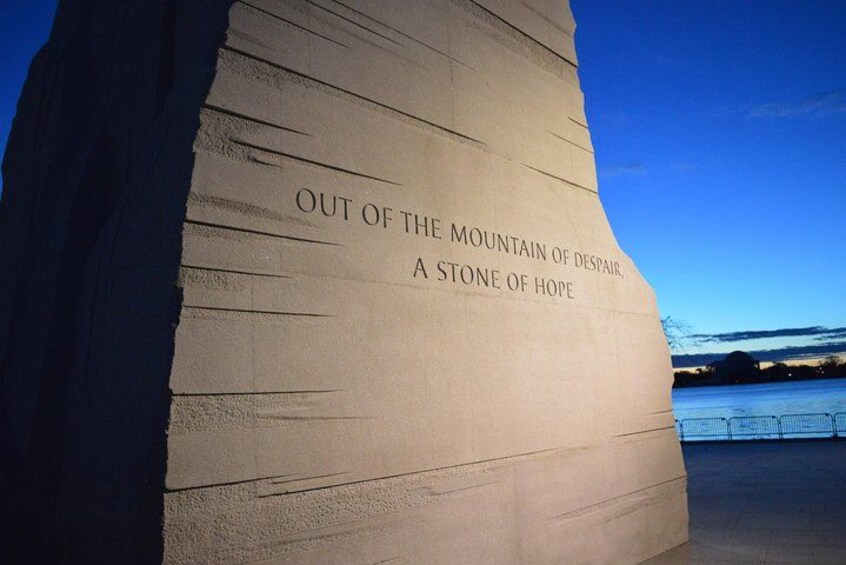 A large stone with the inscription 'Out of the Mountain of Despair, A Stone of Hope.' 2