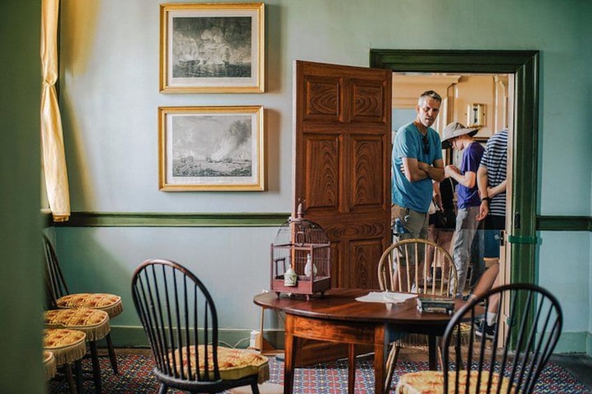 Visitors tour the Little Parlor in the mansion at Mount Vernon. 4