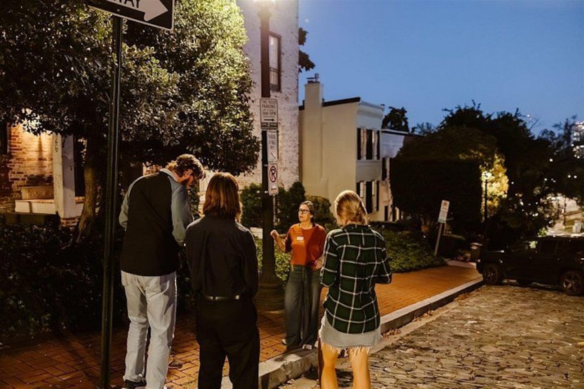 Walk cobblestoned streets of Georgetown at night. 5