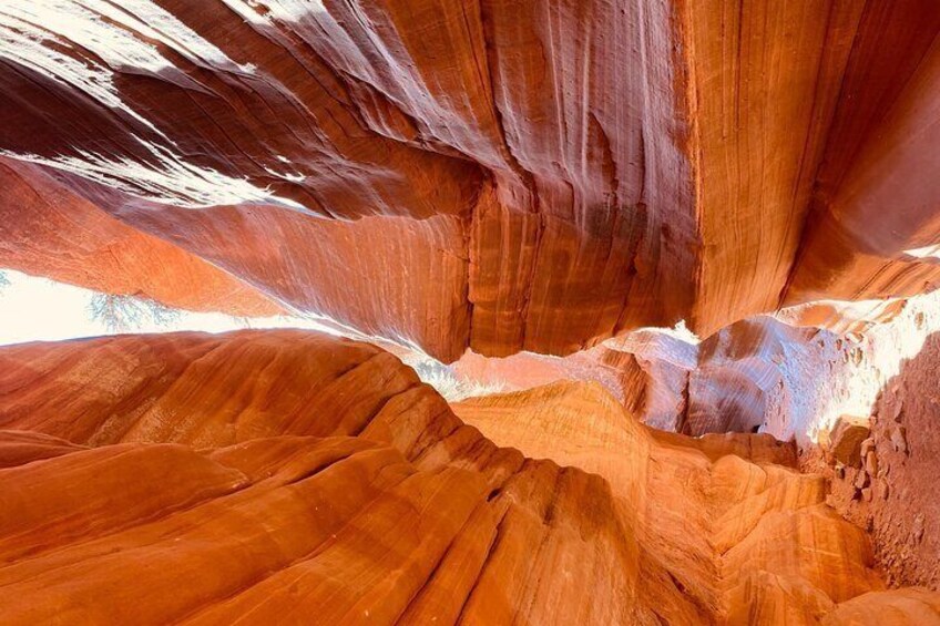 A canyon with layered rock formations. 2