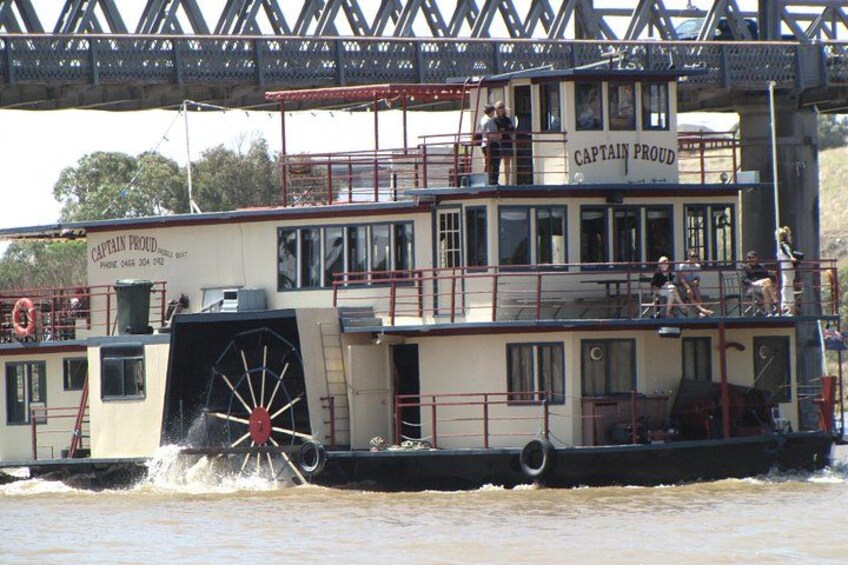 Captain Proud cruising under the bridge 3