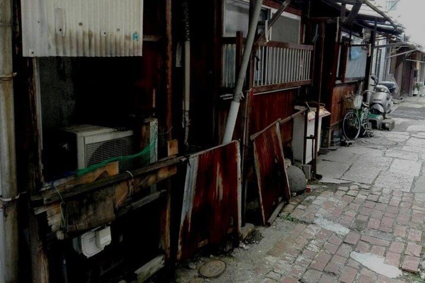 The winding alleys of Osaka's ghetto. The yakuza's stronghold. Don't worry your safe with us. 3