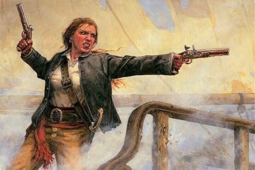A person holding two pistols, wearing a dark jacket and a white shirt, standing on a ship deck. 1
