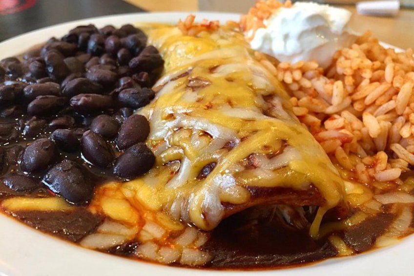 Mini smothered enchilada plate made just for us! Wash it down with the perfect margarita? Sure. Why not! It's included. 3