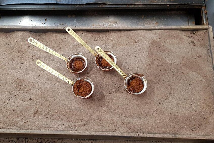 Traditional boiled coffee in the hot sand 4