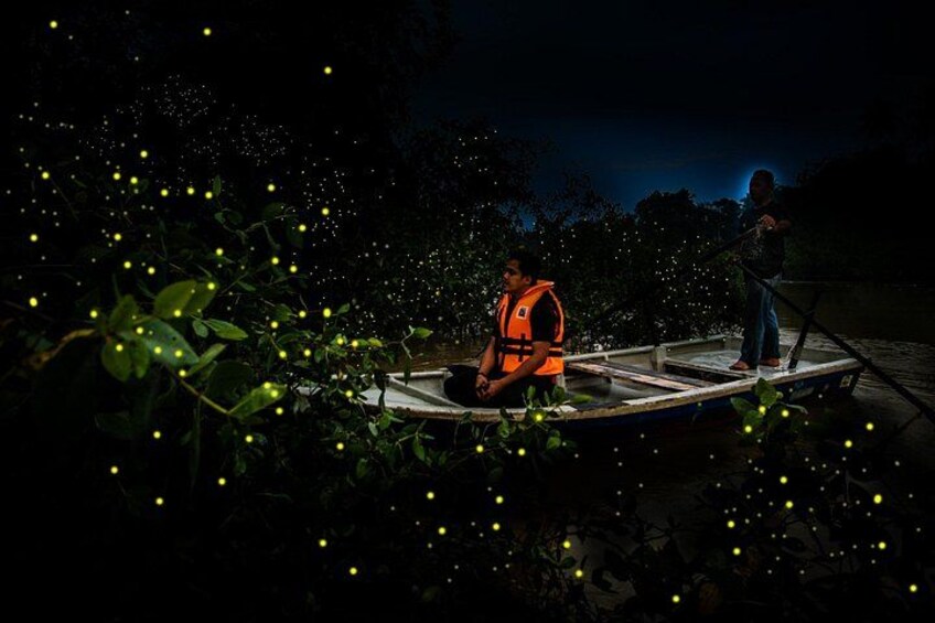 Two people on a boat in a dark environment with glowing lights. 3