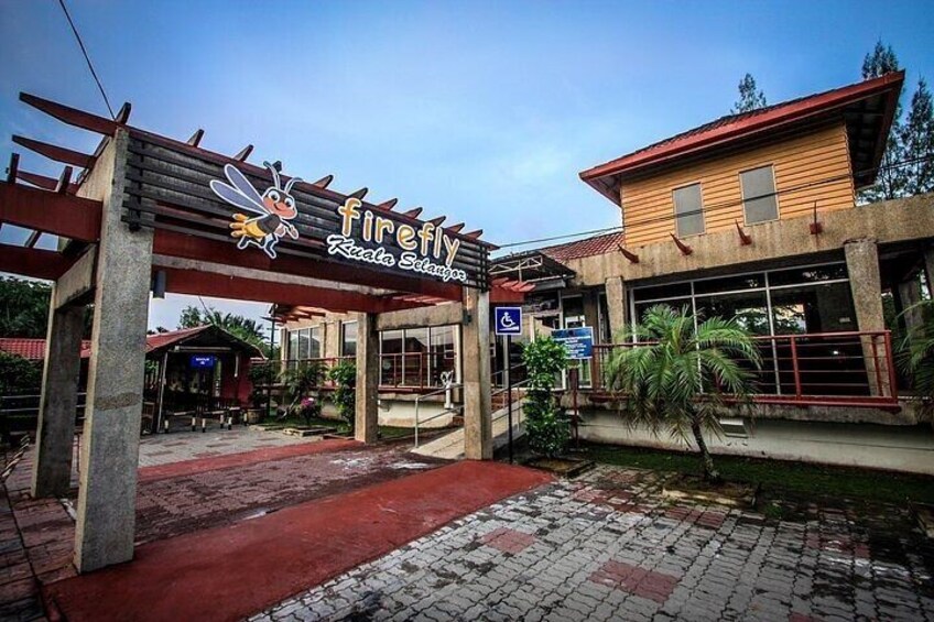 A building entrance with a sign reading "Firefly Kecakapan." 4