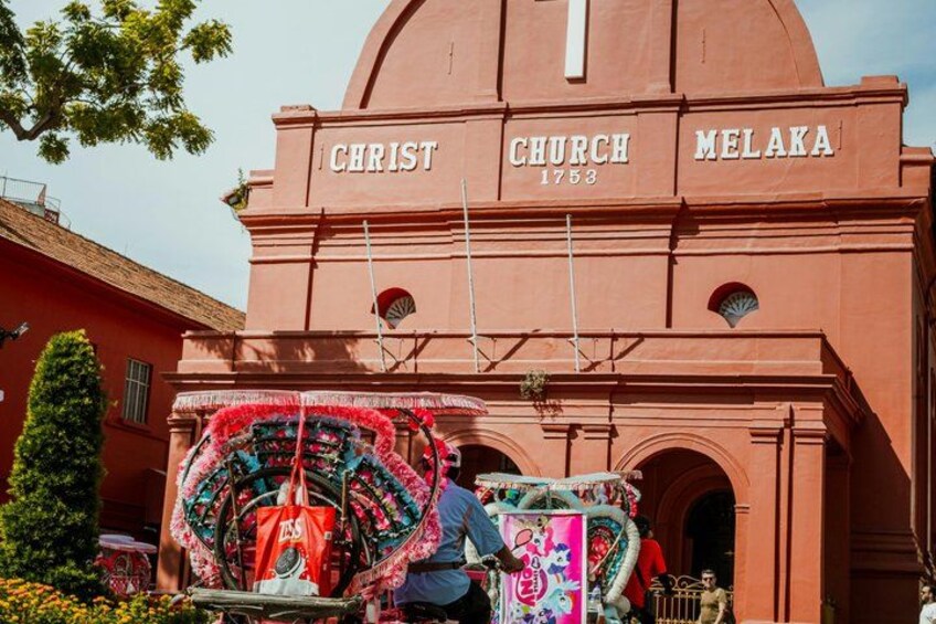 A historic church building with the name 'CHRIST CHURCH MELAKA' and the year '1753' on its facade. 2