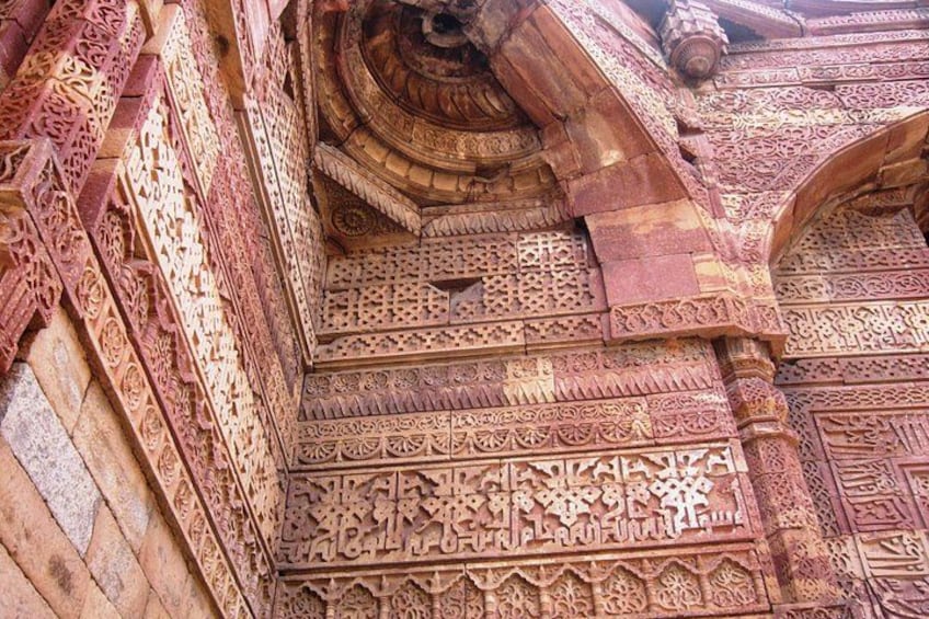 Detailed stone carvings and architectural designs on a historical building. 1