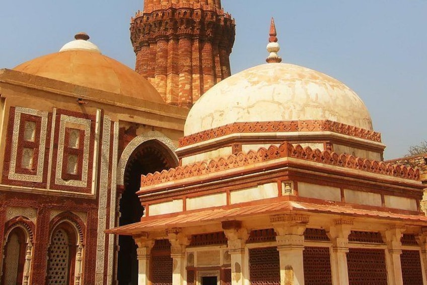 A historical building with domed structures and intricate architectural details. 2