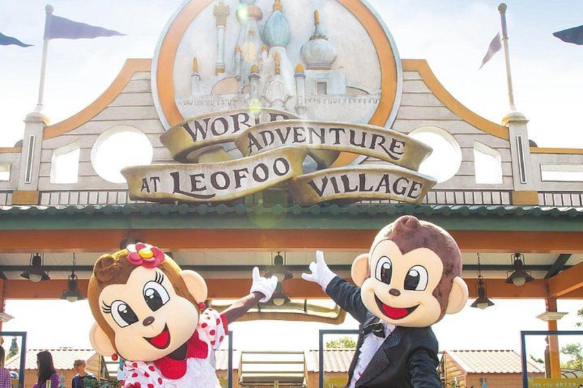 A sign for World Adventure at Leofoo Village with two cartoon characters. 1