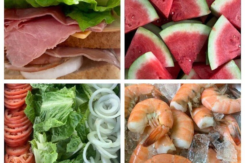 A sandwich with lettuce and tomato, a bowl of sliced watermelon, and a plate of shrimp on ice. 5