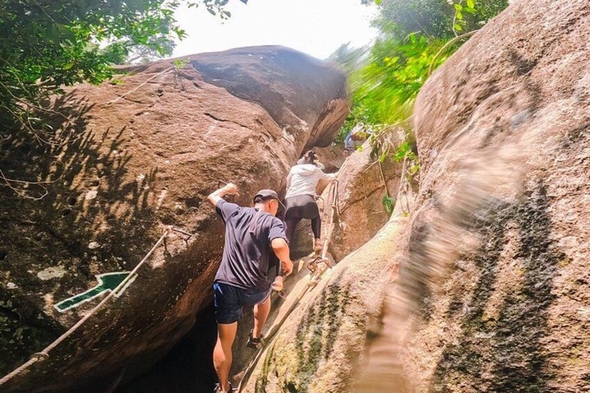 People climbing a rocky mountain path. 2