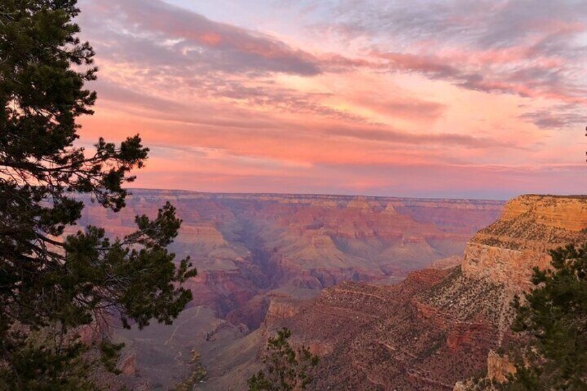 A canyon landscape with a sunset sky. 5