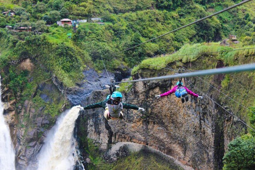 A person bungee jumping from a bridge over a waterfall. 3