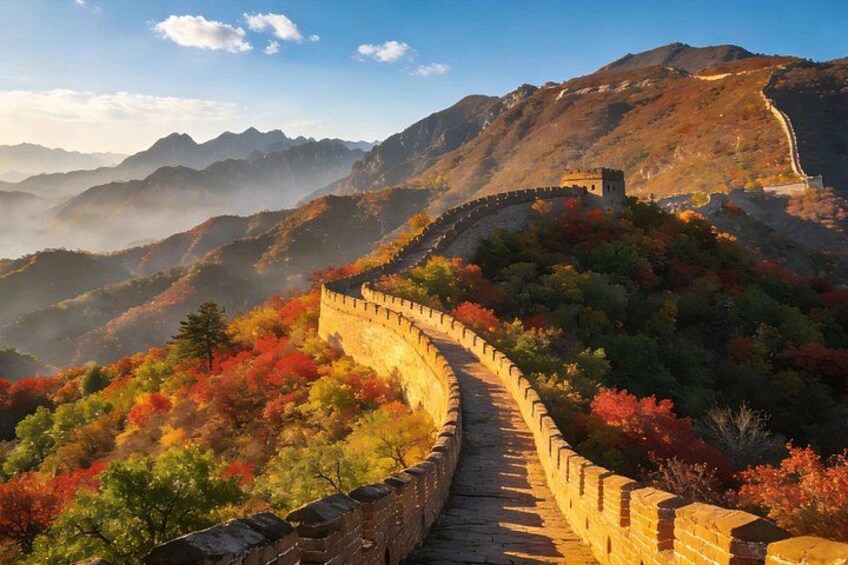 The Great Wall of China winding through a mountainous landscape with autumn foliage. 2