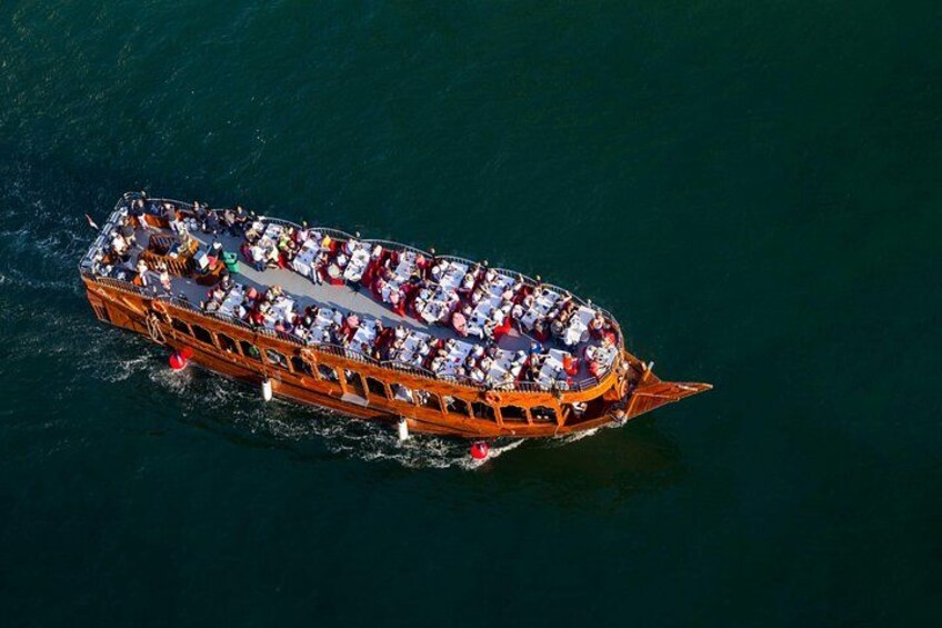 A large, ornately designed boat with multiple decks, floating on a body of water. 1