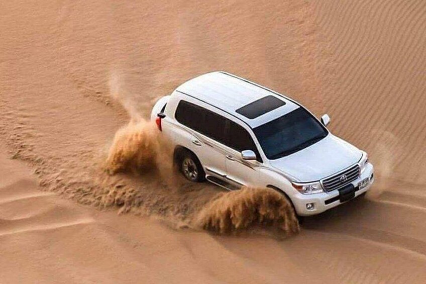 Doha :Half Day Desert Safari | Camel Riding | ATV | Sand Surfing 3