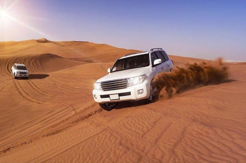 Doha: Desert Safari With Quad bike ,Camel Ride And Sand Boarding 3