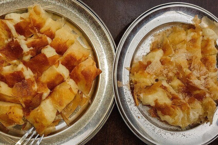 Two plates of baked apple slices with a golden-brown crust. 4