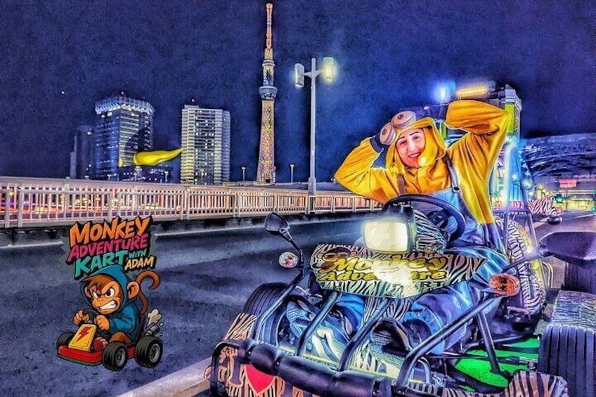 A cityscape at night with a bridge, a tall tower, and a colorful vehicle with a character. 1