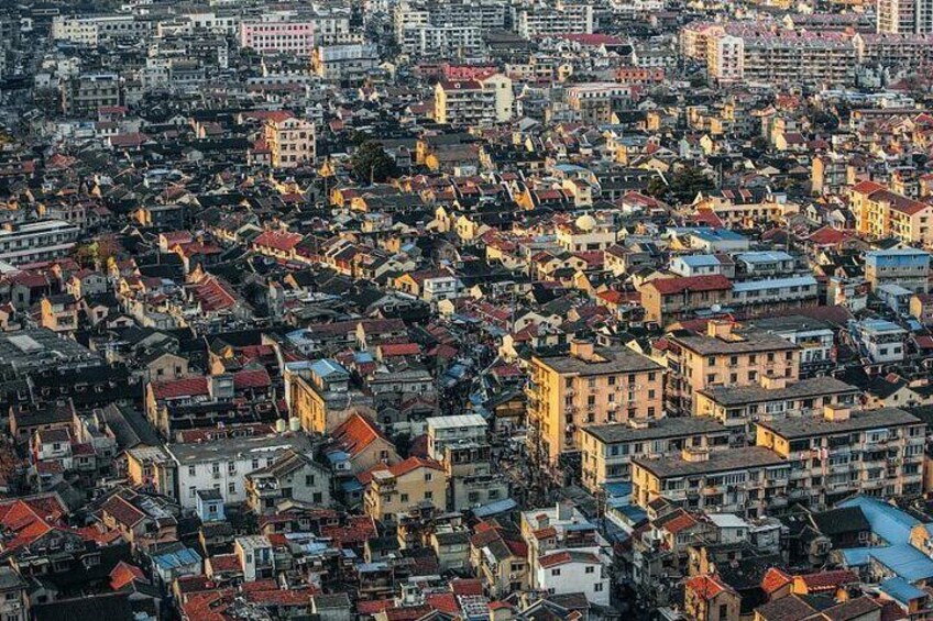 A densely packed urban area with numerous buildings and streets. 2