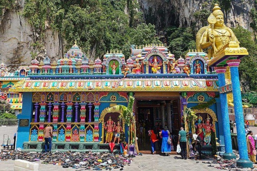 A colorful temple with intricate designs and statues. 4