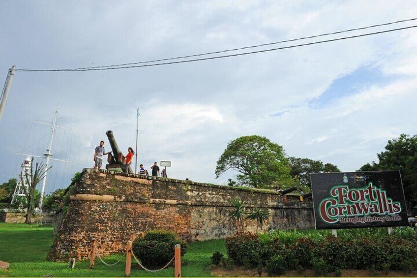 A historical fort with a sign reading "Fort Crawfawallis." 3