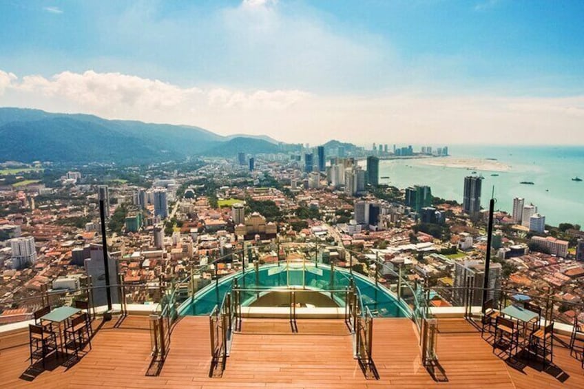 A rooftop pool with a cityscape view. 3