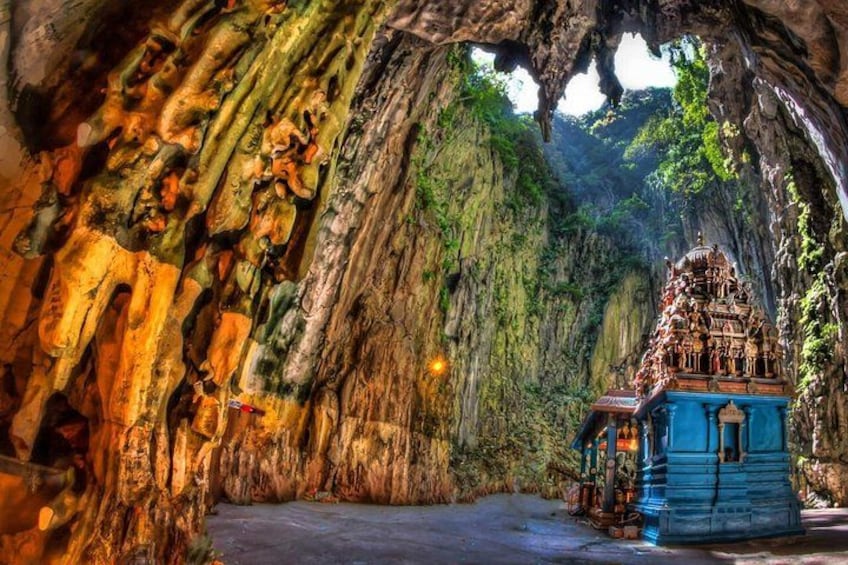 A cave with a temple structure inside. 2