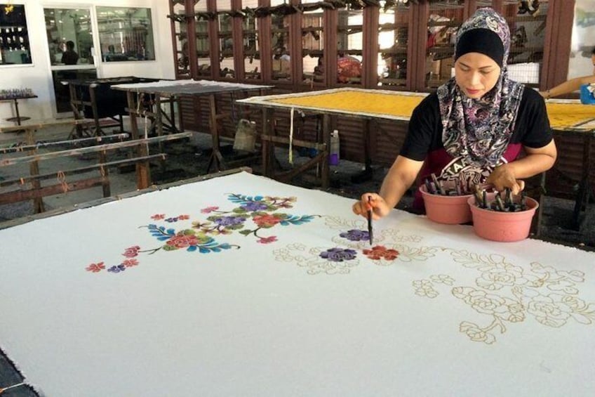 You'll learn about Malaysian arts including pewter-making and batik 1