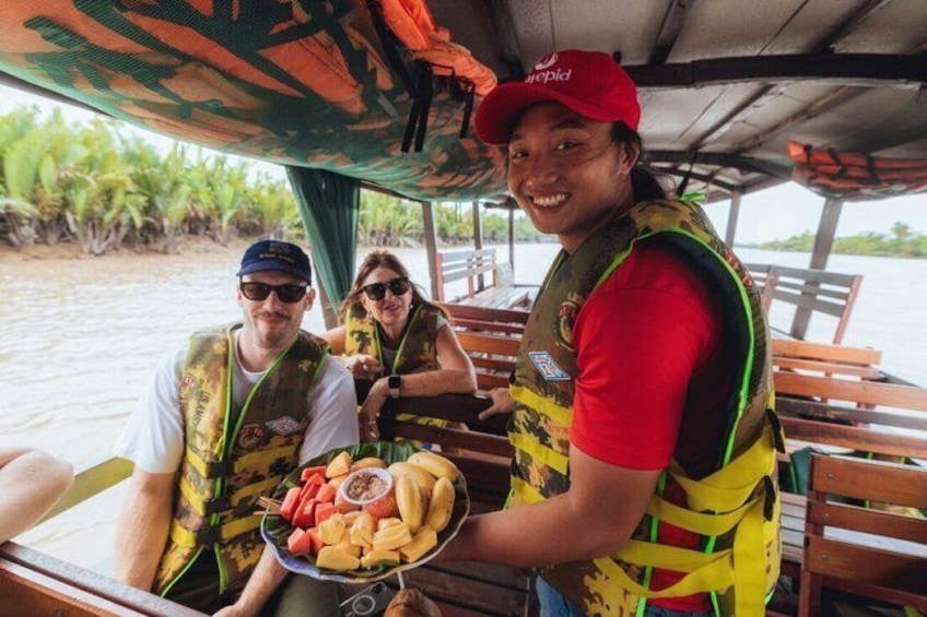 Mekong Delta Day Trip: Boats, Food & Village Life 4