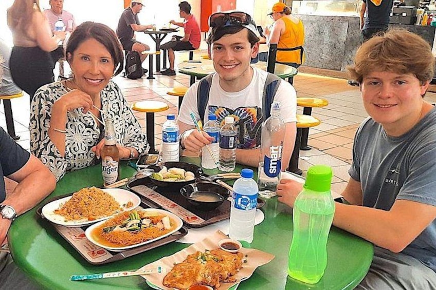 Learn how to navigate Singapore's Hawker Centres with ease. 3
