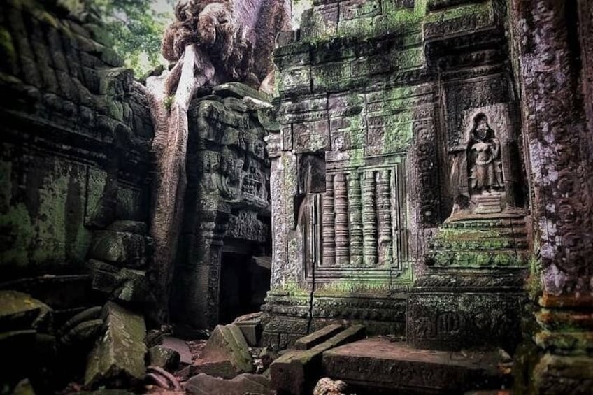 Ancient stone architecture with carvings and a weathered appearance. 3