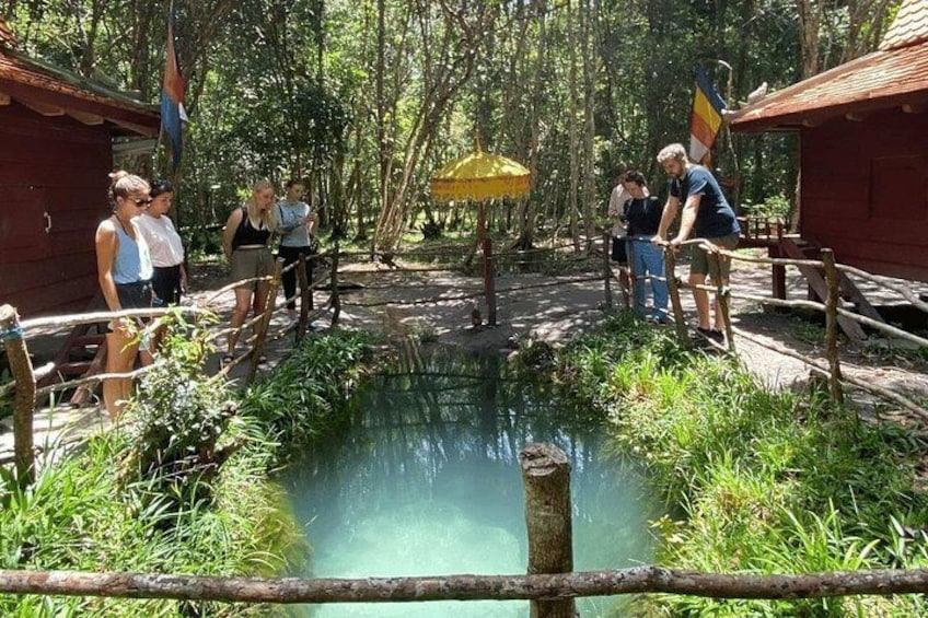 Spot the magnificent pond which believed a holy 7-color pond, never dried out pond, on Kulen Waterfall Tour 5