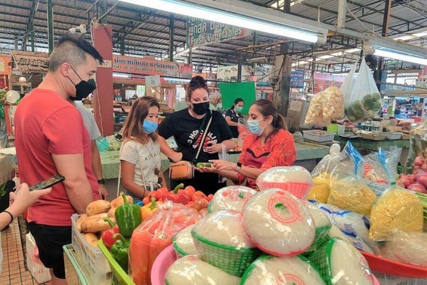 Fruit tasting, selecting and buying ingredients at the market 3