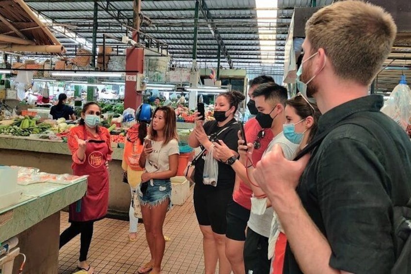 Fruit tasting, selecting and buying ingredients at the market 2